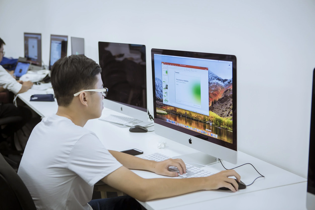 A young man using a computer. Photo: UNICEF Viet Nam\Truong Viet Hung